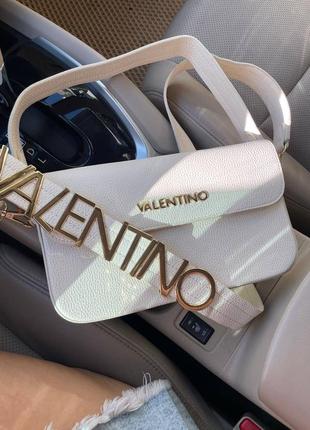 Бежева сумка клатч valentino