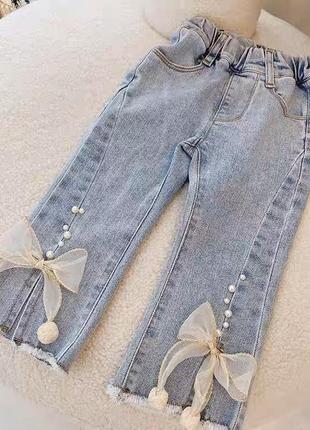 Нові джинси з розрізами