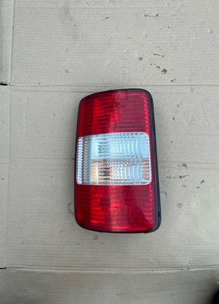 2K0945111A Ліхтар задній лівий Volkswagen Caddy III 2004 — 2015