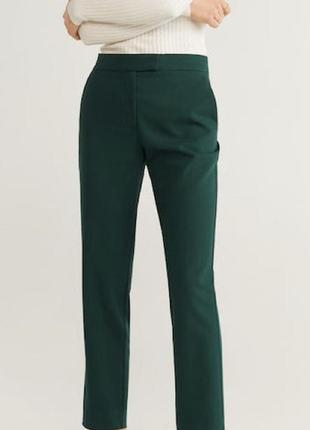 Зеленые изумрудные штаны брюки замками молниями снизу низкая т...