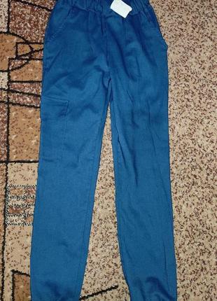 Синие брюки лосины с карманом на резинке