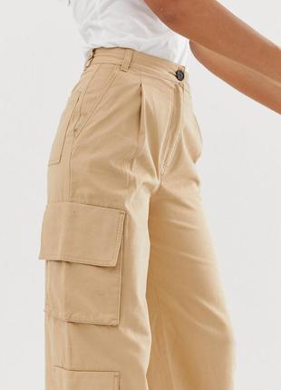 Бежеві пісочні широкі джинси-кльош карго широкі з кишенями з б...