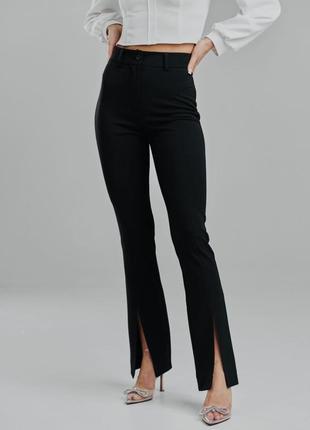 Брюки жіночі клешные стрейчеві чорні штани з розрізами morgan- s