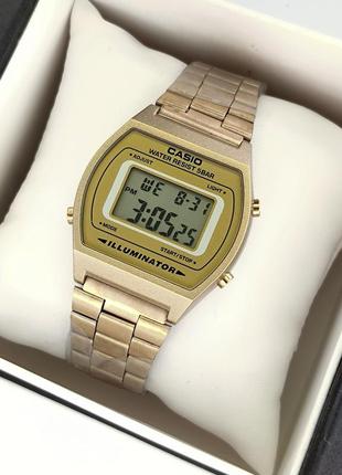 Металлические наручные электронные часы золотого цвета с подсв...