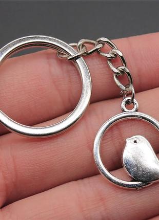 Брелок металлический серебристый для ключей "Птица в кольце"