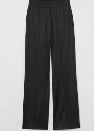 Стильні довгі широкі брюки-джогери (ефект атласної тканини)