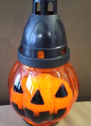Свічка гарбуз у великій скляній лампадці melinera для halloween.