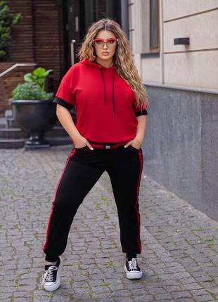 Женский спортивный костюм цвета красно-черный 434713