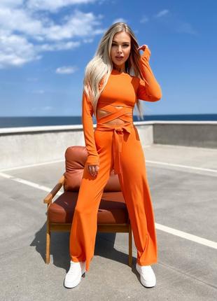 Женский костюм с топом и брюками палаццо оранжевого цвета р.42...