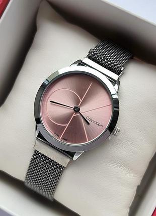 Кварцевые наручные женские часы серебристого цвета с розовым ц...