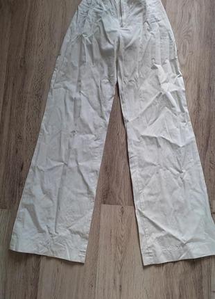 Легкие белые брюки брючины клеш