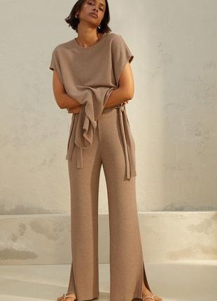 Стильные широкие брюки палаццо с разрезами в этно, бохо стиле h&m