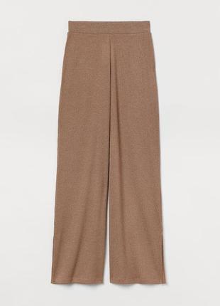 Стильные широкие брюки палаццо с разрезами в этно, бохо стиле ...