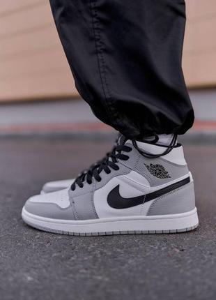 Женские кроссовки nike air jordan 1 retro mid smoke grey