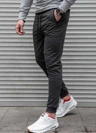 Серые мужские спортивные штаны на манжетах