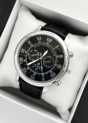 Серебристые мужские наручные часы с черным циферблатом, на чер...
