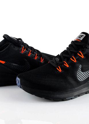 Чорні з помаранчевим кросівки Nike zoom structure 22x