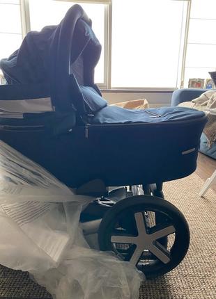Нова дитяча коляска з люлькою в упаковці