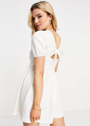 Фактурна біла сукня