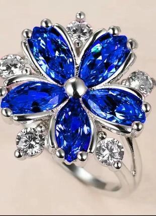 Кольцо с камнями белыми и синими в виде лепестков цветов Кольц...