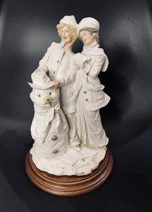 Фарфоровая статуэтка девушка и снеговик belcari capodimonte