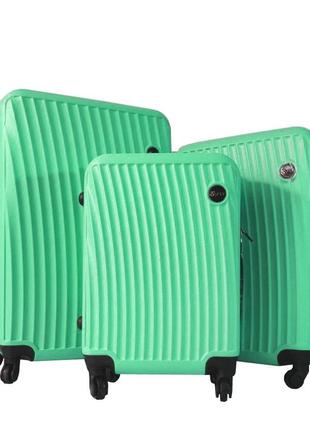 Комплект пластикових валіз на 4-колесах fly м'ятний колір, наб...