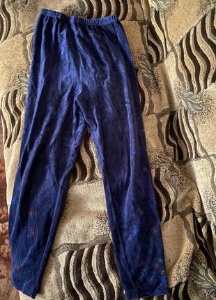 Теплі велюрові темно-сині штани жіночі в квіточку