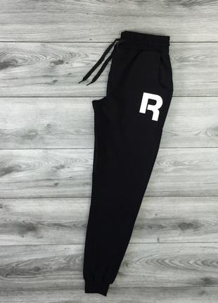 Мужские чёрные спортивные штаны с принтом "Reebok"