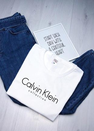 Женская белая футболка с принтом "Calvin Klein"