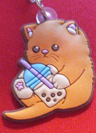 Брелок на ключи резина кошка кот рыжий пяточка
