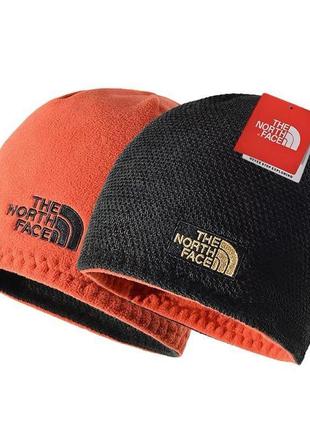 Двустороння шапка the north face оранжевий фліс + чорний трикотаж