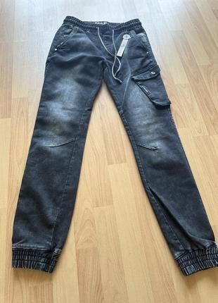 Черные джиггеры джинсы