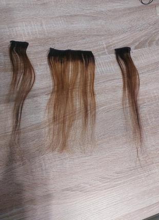 Натуральне волосся для нарощування з залишками клею