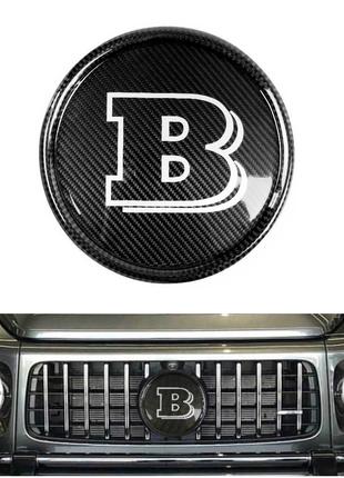 Карбоновая эмблема Brabus в решетку радиатора Mercedes G-class...