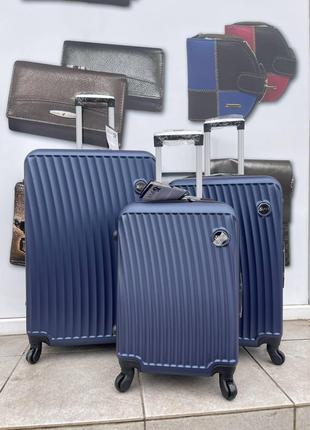 Набор из трех чемоданов FLY-2019 на 4-х колёсах, материал АБС-...