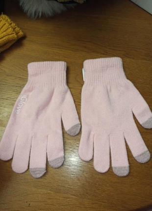 Рожеві трикотажні рукавички