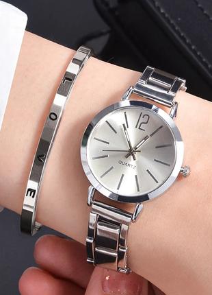 Комплект жіночий кварцевий наручний годинник та браслет. Женск...