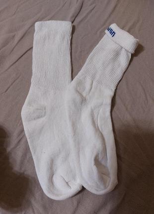 Білі високі шкарпетки