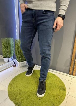 Мужские джинсы утепленные на еврофлисе темно-синие
