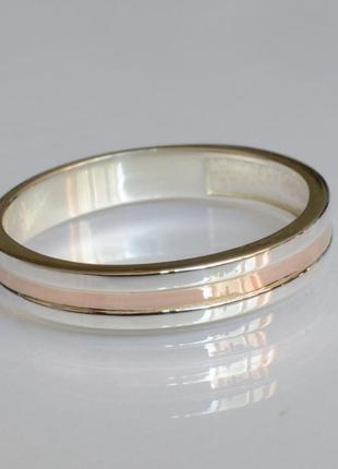 Обручальное кольцо из серебра с вставками из золота