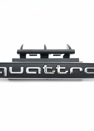 Емблема Quattro на решітку Audi (чорний+хром) 9.4*1.4 см