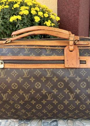 Дорожня сумка бренду Louis Vuitton