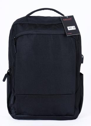 Универсальный мужской рюкзак черного цвета с потайным карманом...