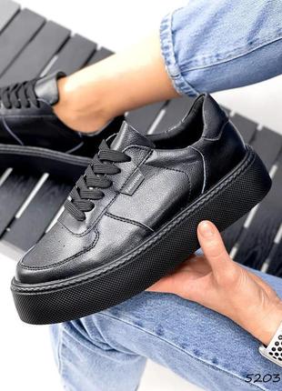 Кросівки чорного кольору з натуральної шкіри