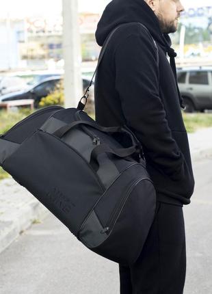 Дорожная спортивная сумка nike anta на 55 литров черного цвета