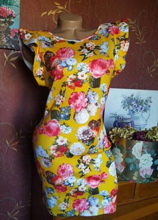Жовта сукня міні з квітковим принтом від luc&ce