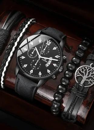 Комплект чоловічий кварцевий наручний годинник та браслети.