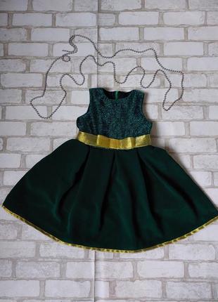 Нарядное зеленое платье на девочку