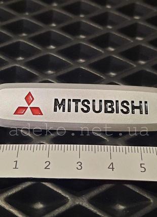 Шильдик Mitsubishi для ЭВА ковриков в салон автомобиля Код/Арт...