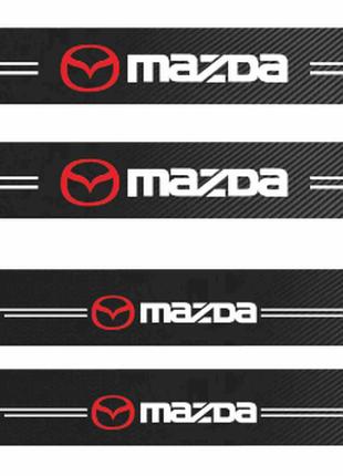Защитная наклейка на пороги авто Mazda карбон